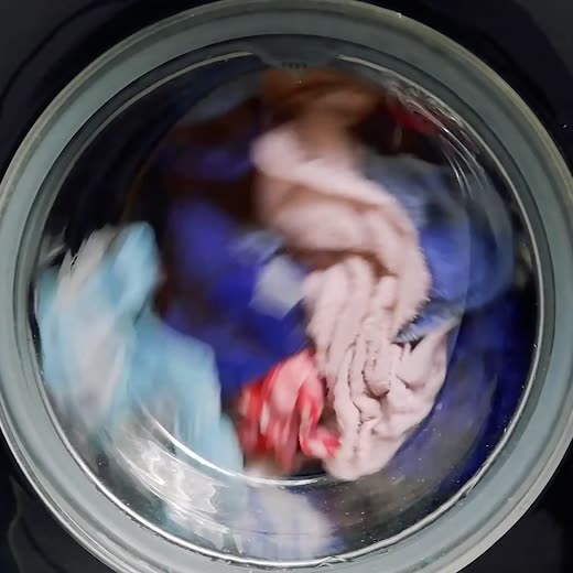 A washing machine mid-spin